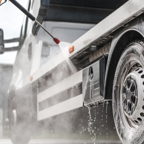 pressure washing a truck bed